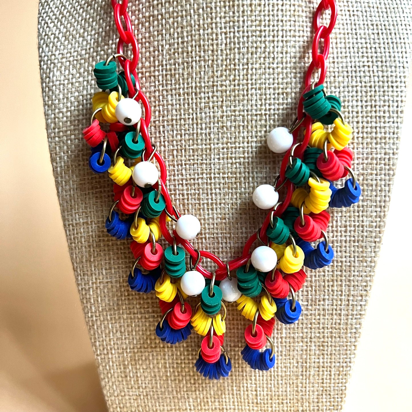 Plastic primary necklace and optional matching earrings