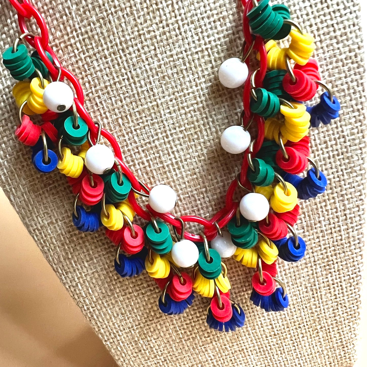 Plastic primary necklace and optional matching earrings