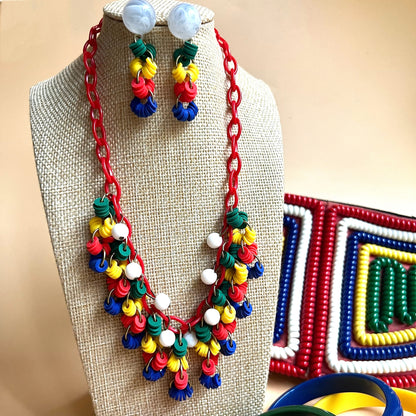 Plastic primary necklace and optional matching earrings