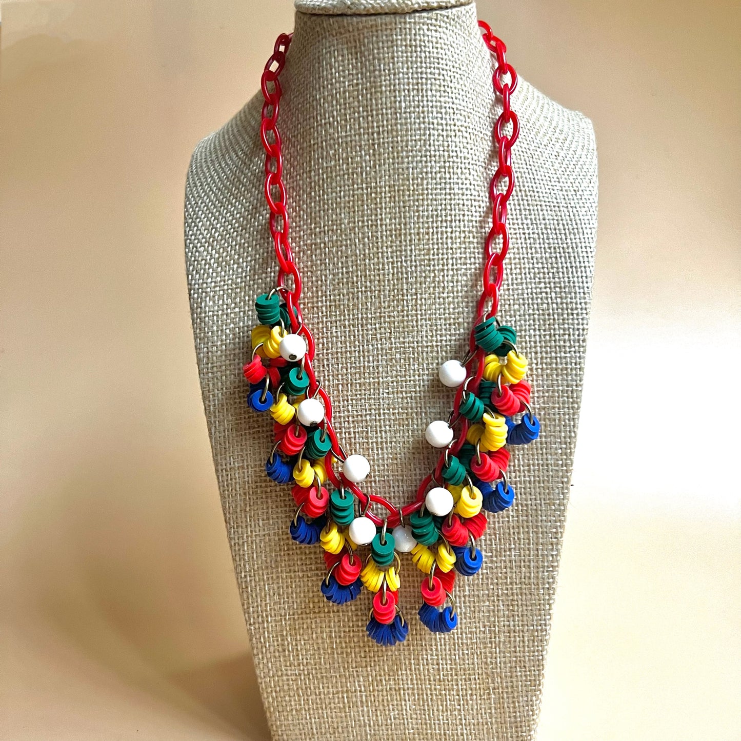 Plastic primary necklace and optional matching earrings