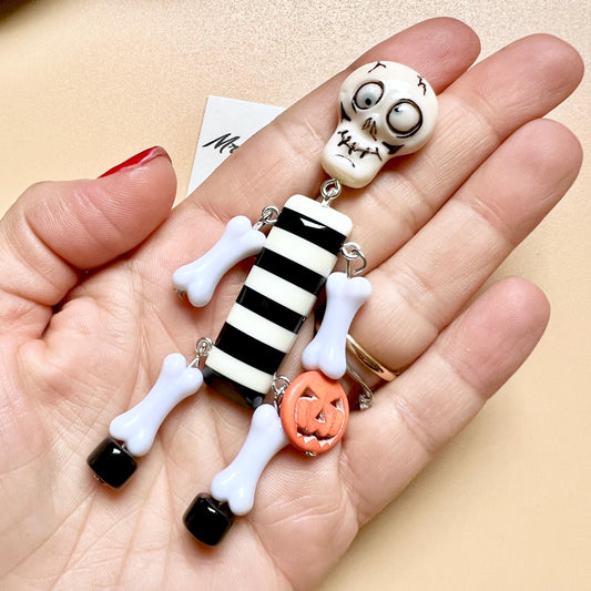 Skeleton dance resin brooch