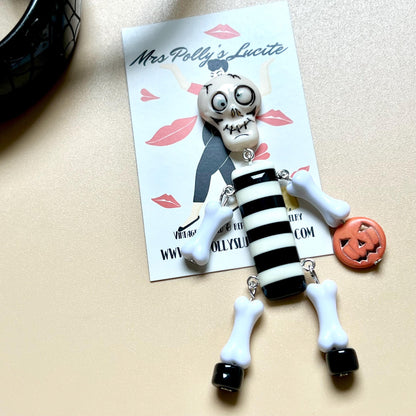 Skeleton dance resin brooch